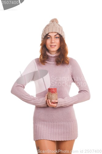 Image of Beautiful woman holding candle