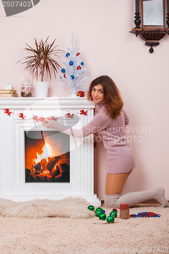 Image of Hot girl at home in Christmas time