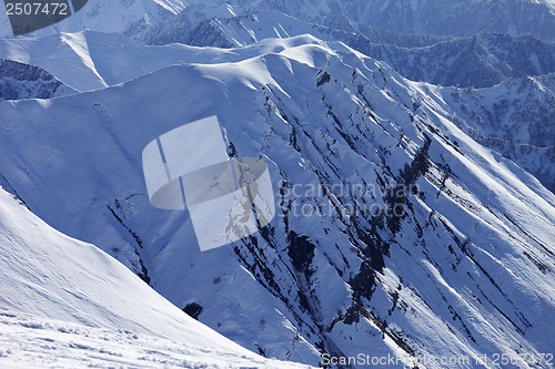 Image of View from ski slope on snowy rocks