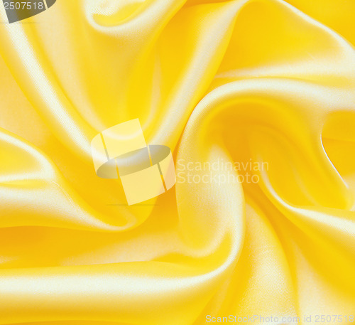 Image of Smooth elegant golden silk as background