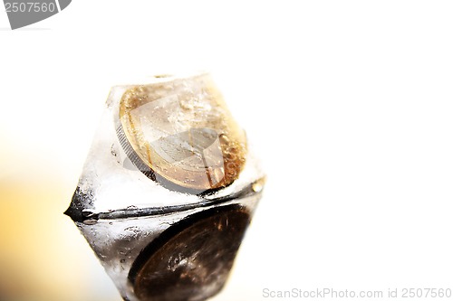 Image of coin in ice cube