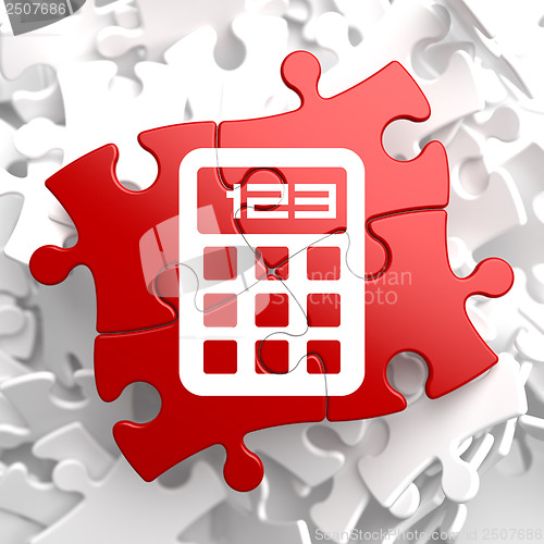 Image of Calculator Icon on Red Puzzle.