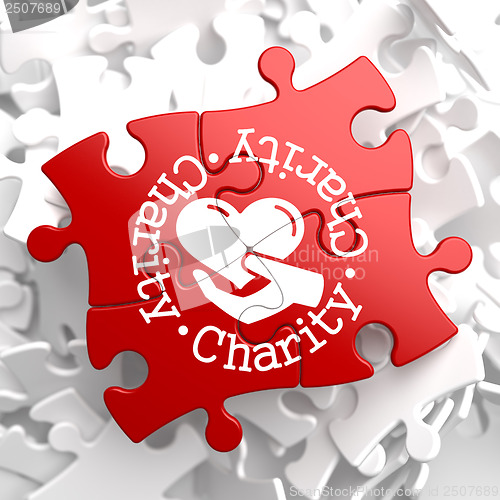 Image of Charity Concept on Red Puzzle.