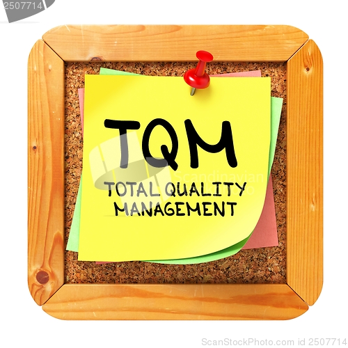 Image of TQM. Yellow Sticker on Bulletin.