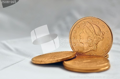 Image of Golden dollar coins from 1900