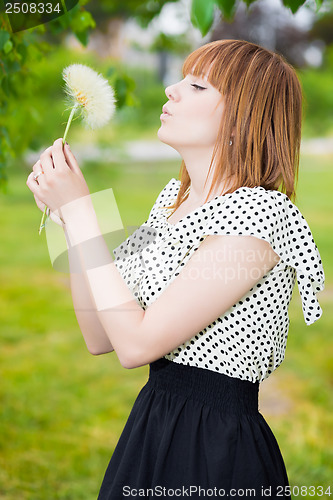 Image of Young redhead woman