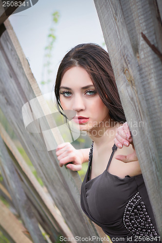 Image of Pensive woman in gray dress