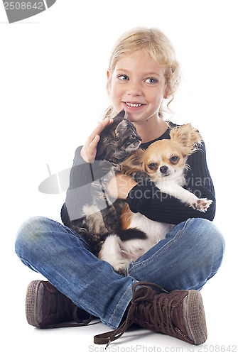 Image of child and chihuahua