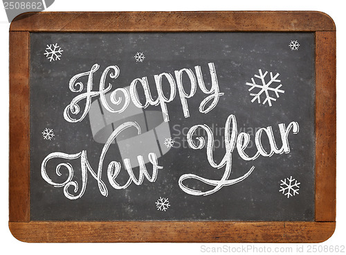 Image of Happy New Year on blackboard