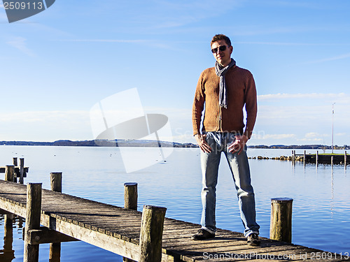 Image of Man on landing stage