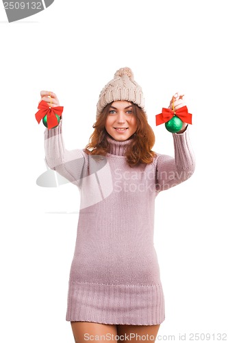 Image of Young woman with christmas ball