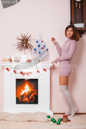 Image of Hot girl at home in Christmas time