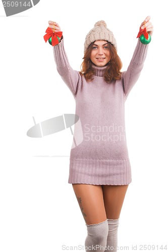 Image of Young woman with christmas ball
