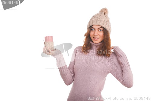 Image of Beautiful woman holding candle