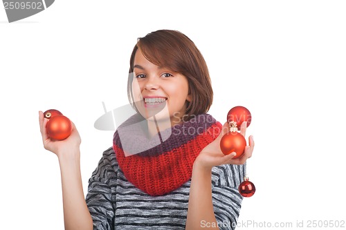 Image of Young woman with christmas ball
