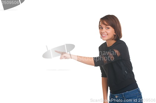 Image of Girl pointing at something and smiling