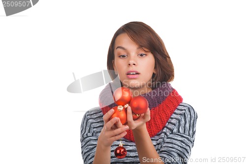 Image of Young woman with christmas ball