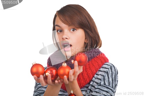 Image of Young woman with christmas ball