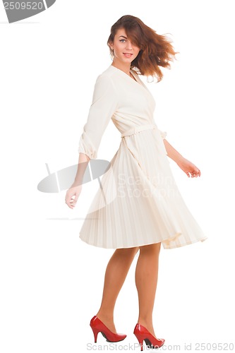 Image of Beautiful woman in white dress