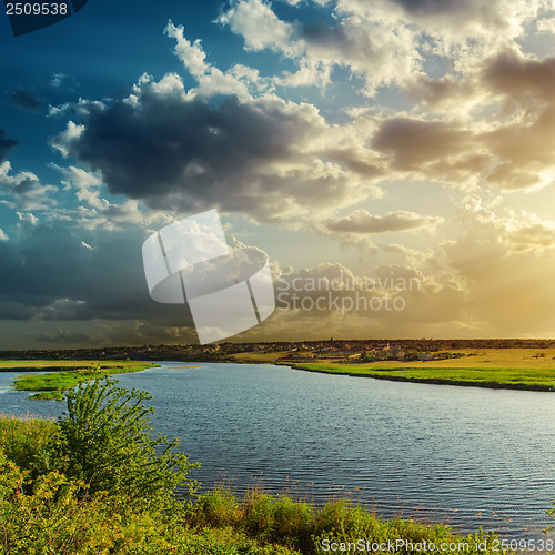 Image of river and cloudy sunset