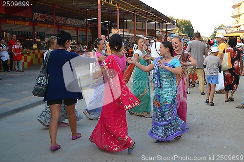 Image of Krishnaites dance on the street in Anapa