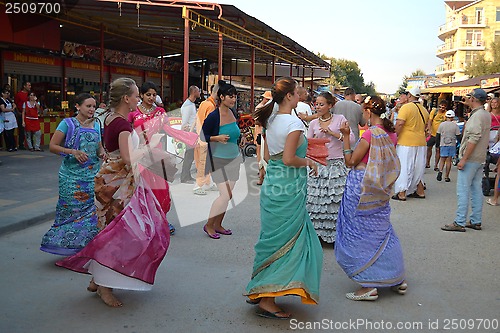 Image of Krishnaites dance on the street in Anapa