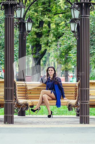 Image of Girl sitting in the park