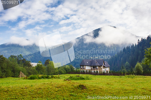 Image of House among mountains