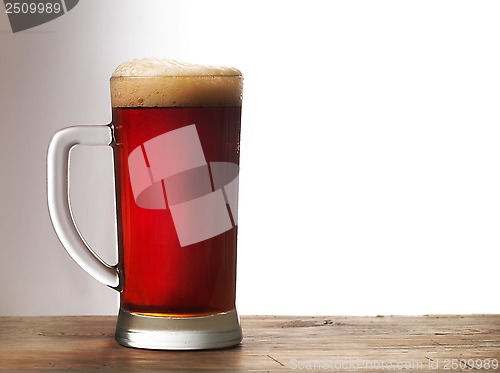 Image of Frosty mug of dark beer