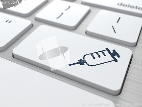 Image of White Keyboard  Button with Syringe Icon.