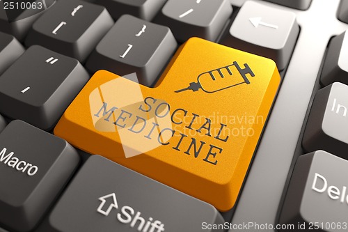 Image of Keyboard with Social Medicine Orange Button.