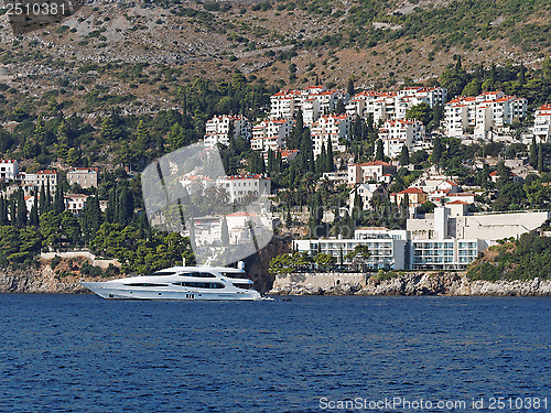 Image of South of Dubrovnik , Crotia, yacht with coastline in the backgro