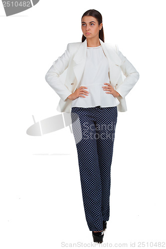 Image of Business woman in a white suit