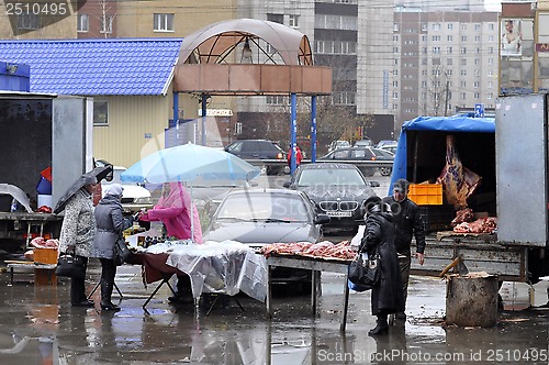 Image of Agricultural fair. Trade in meat on the street.