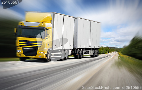 Image of 	truck driving on country-road