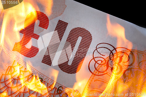 Image of £10  burning