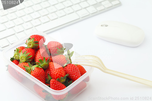 Image of Healthy lunch box in working desk 