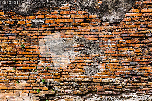 Image of Ancient brick wall in red color