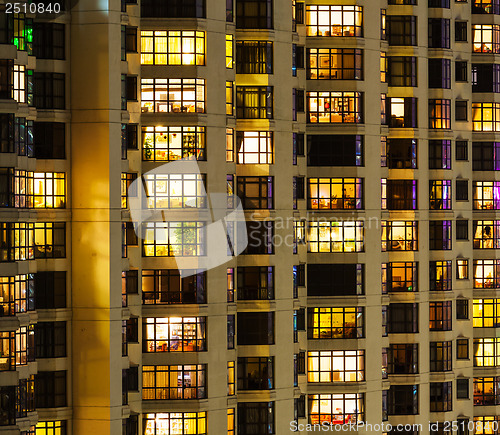 Image of Extrior of apartment building at night