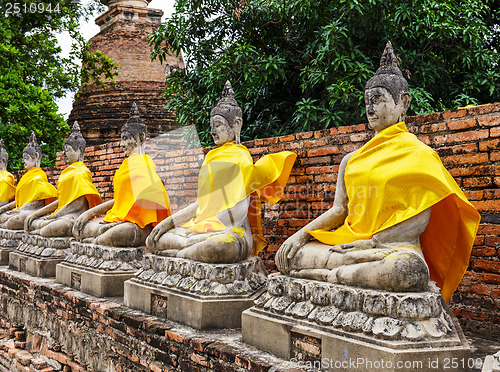 Image of Row of ancient Buddha statue in temple