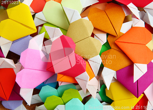 Image of heap of origami colorful heart