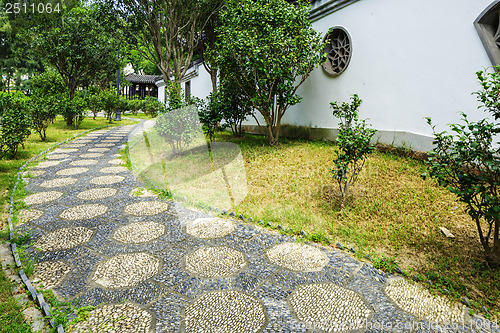 Image of Pebble stone path in chinese garden