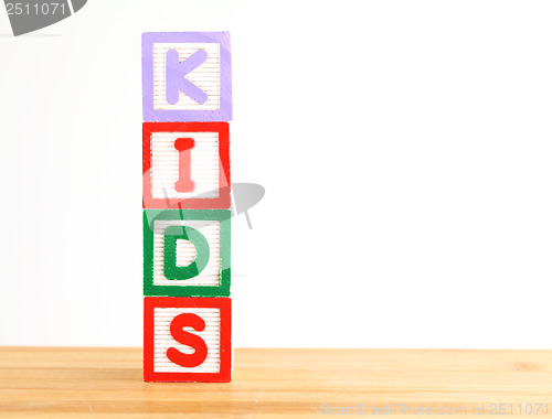 Image of Alphabet building blocks that spelling the word kids