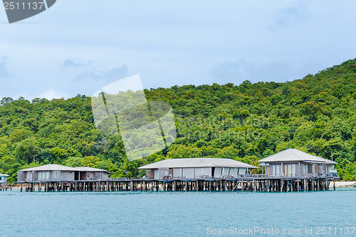 Image of Wooden house with seascape