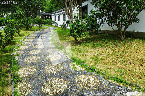 Image of Pebble stone path in chinese garden