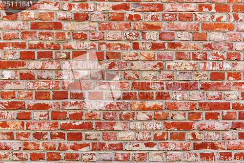 Image of Ancient brick wall in red color