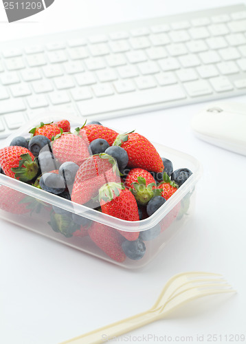 Image of Berry mix lunch box on working desk