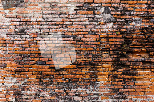 Image of Ancient brick wall in red color