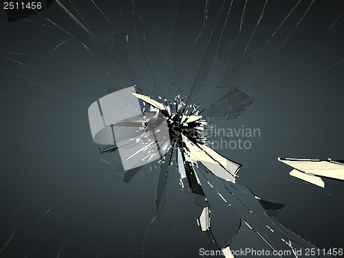 Image of Broken glass with bullet hole on black