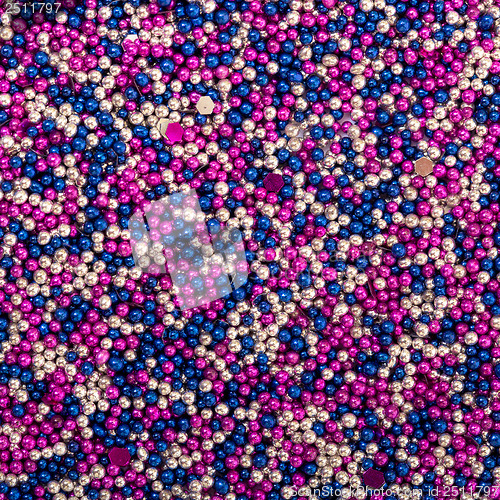 Image of Background from White, Blue and Pink  Balls of Bead